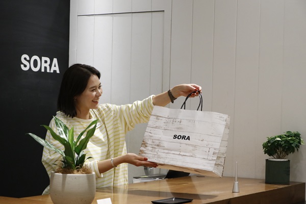 【恵比寿ガーデンプレイス】アウトドア/カジュアルブランドの接客販売｜未経験歓迎の求人画像